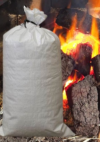 Peat briquette fire burning - peat,